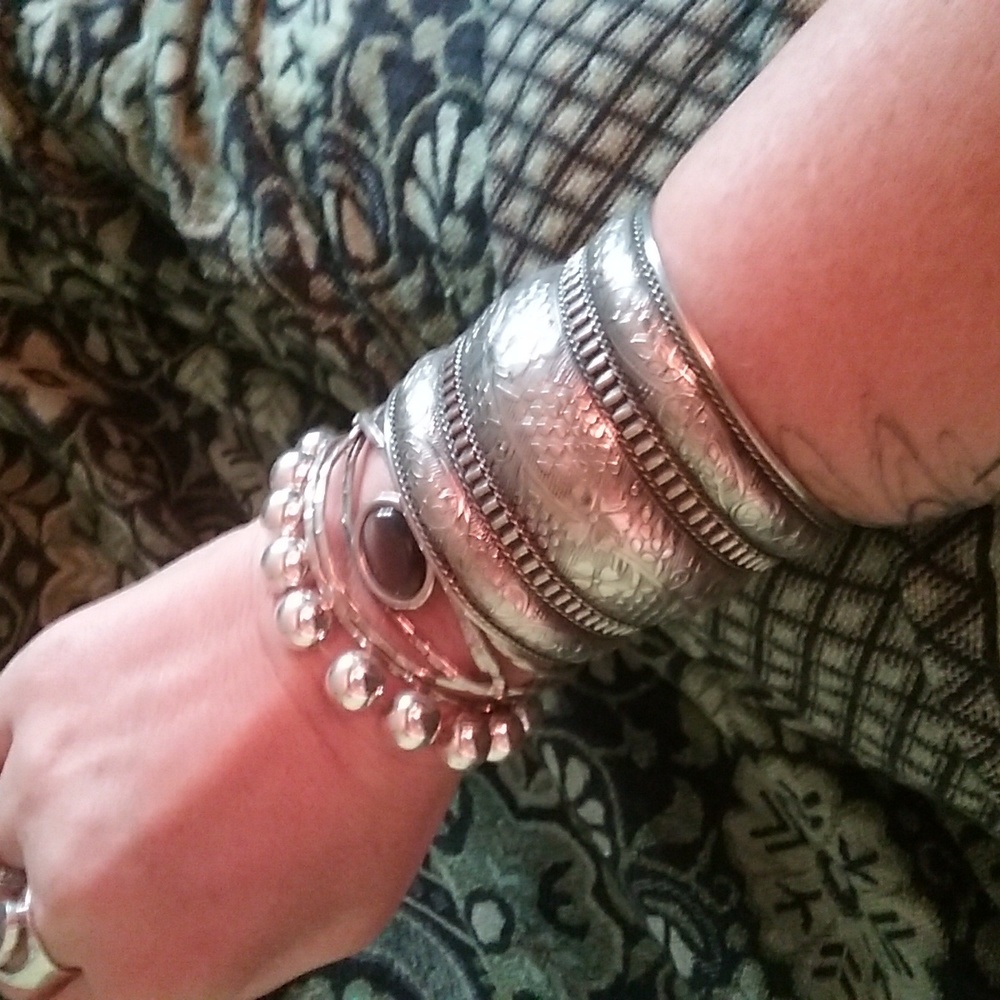 3 silvertone bracelets